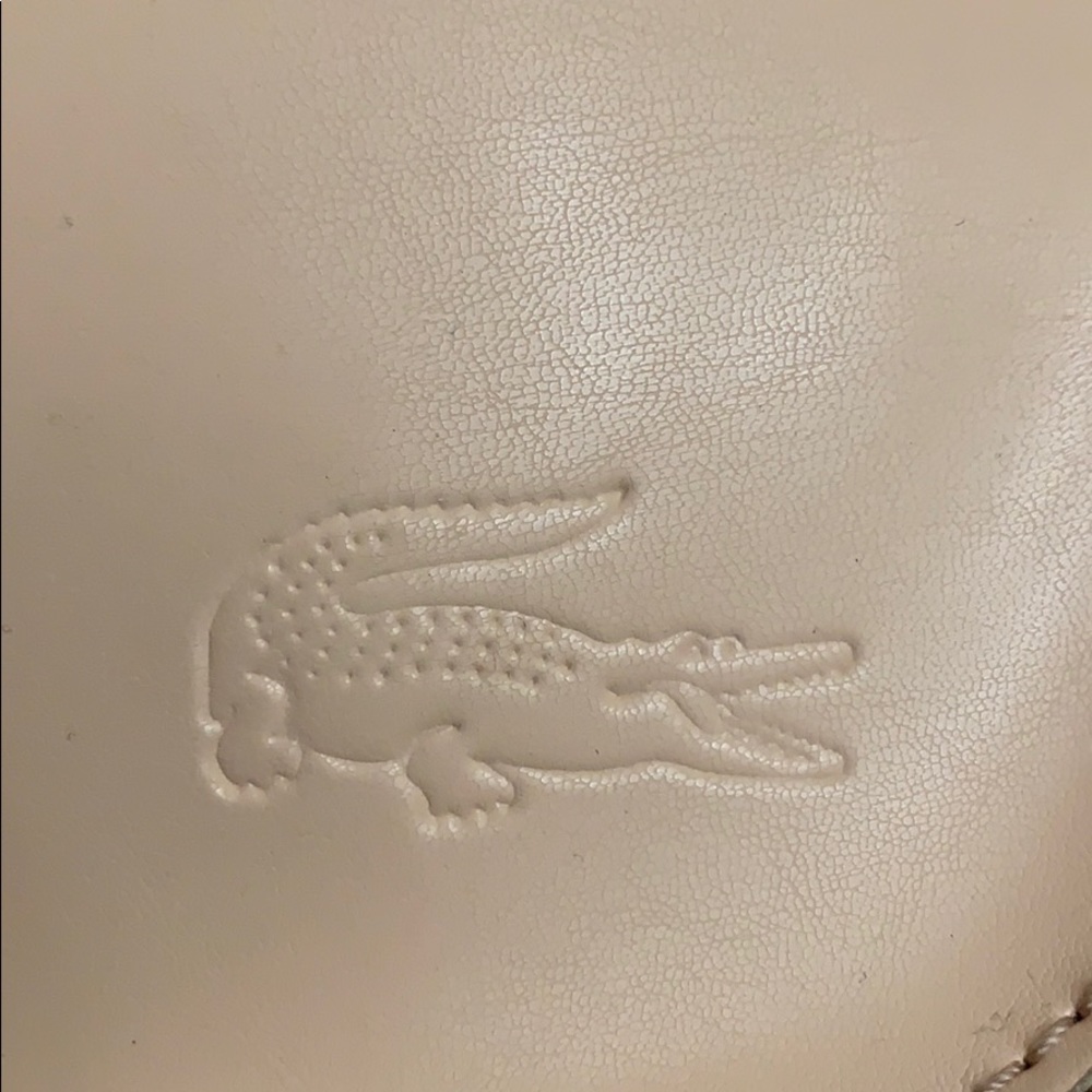 Authentic Lacoste crossbody bag cream colored